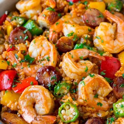 A pan of jambalaya made with shrimp, sausage, chicken, rice and vegetables.