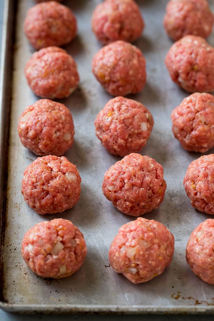Homemade meatballs on a sheet pan.