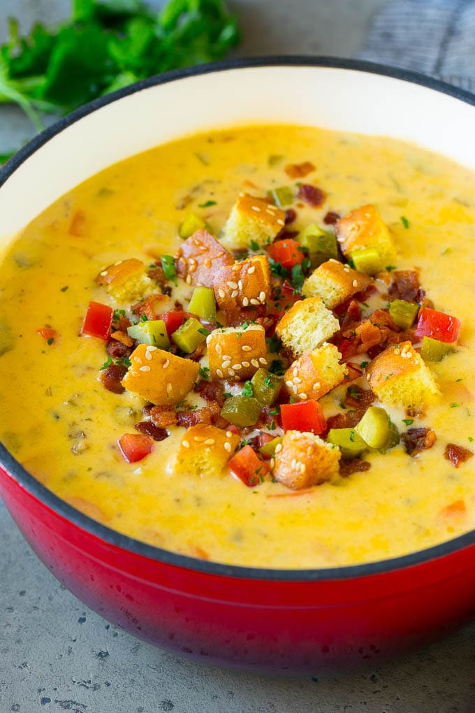 Cheeseburger Soup Recipe | Hamburger Soup | Cheese Soup #soup #groundbeef #hamburger #cheese #bacon #dinner #dinneratthezoo Cheeseburger soup topped with bacon, tomato, pickles and croutons.