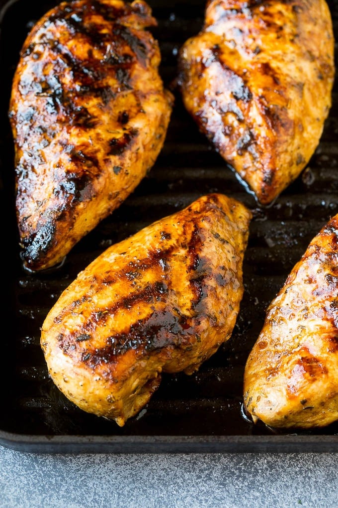 Marinated chicken cooked on a grill pan.