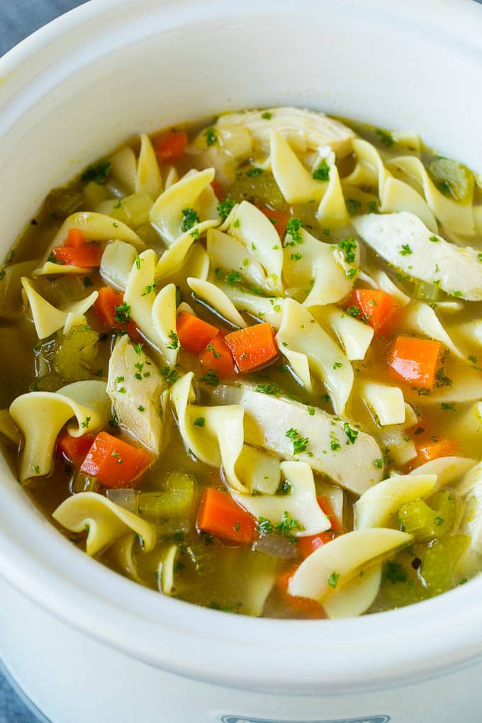 Crock pot chicken noodle soup with vegetables.