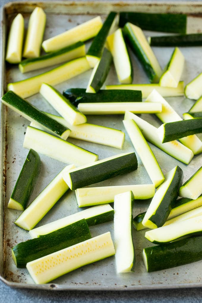 Raw sticks on a sheet pan.