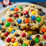 These monster cookies are soft and chewy peanut butter oatmeal cookies loaded with chocolate chips and M&M's.