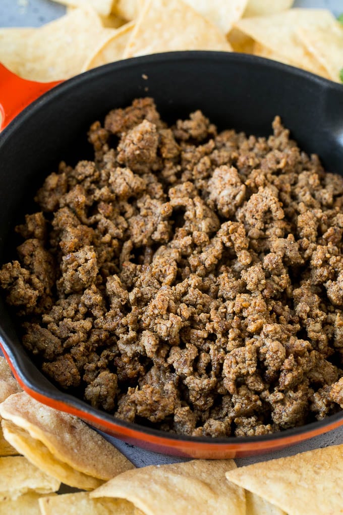 Cooked ground beef in a skillet.