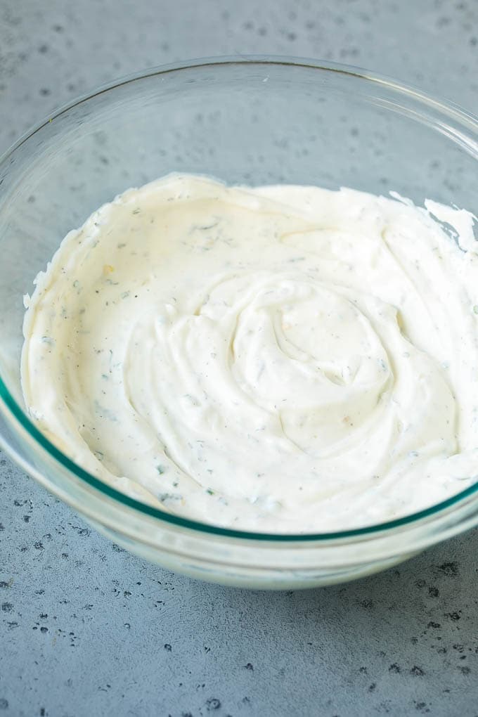 Sour cream and mayonnaise mixed with dried and fresh herbs and spices.