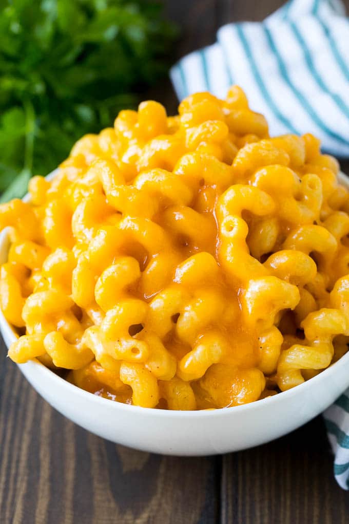 A bowl of baked macaroni and cheese.
