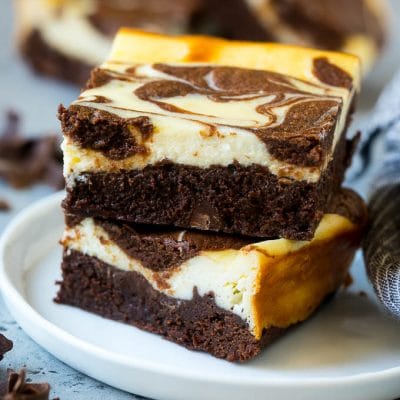 Cheesecake brownies with a rich brownie base and cream cheese topping.