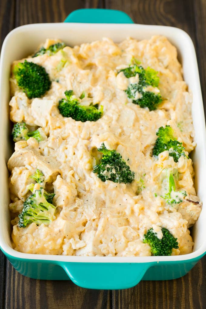 Creamy rice, chicken and broccoli in a casserole dish.