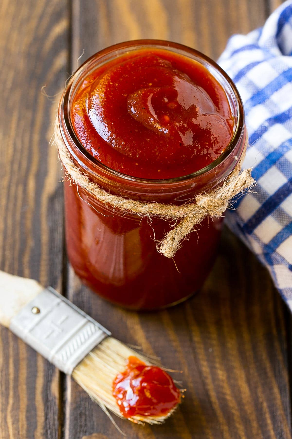 An overhead shot of a jar of BBQ sauce.