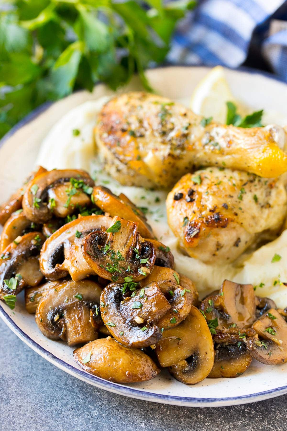 Sauteed mushrooms served with chicken and mashed potatoes.