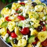 Tortellini salad with cucumber, tomato, olives and feta cheese.