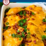 This pierogi casserole is potato pierogies layered with bacon, onions and a creamy sauce, then topped off with cheese and baked to perfection.