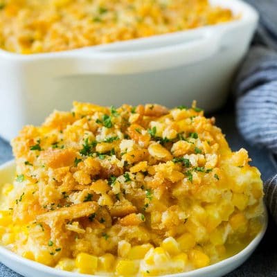 A serving of scalloped corn topped with buttery cracker crumbs.