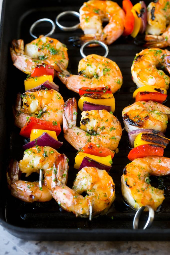 Shrimp skewers on a grill pan.