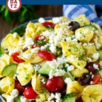 This Greek tortellini salad is a mix of cheese tortellini, cucumbers, olives, tomatoes and feta cheese, all tossed in a garlic and herb dressing.