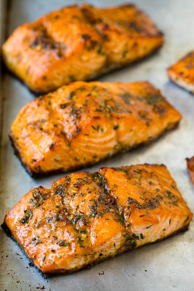 Roasted salmon topped with garlic and herbs.