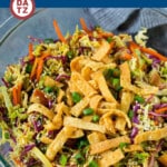 This recipe for Chinese chicken salad is loaded with chicken, veggies, wontons and almonds, all tossed in a sesame ginger dressing.
