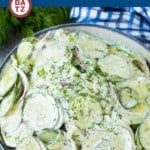 This creamy cucumber salad, also known as German cucumber salad, is a refreshing combination of cucumbers, red onion and dill tossed in a simple dressing.