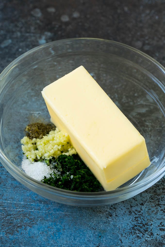 Butter with garlic, herbs, salt and pepper.