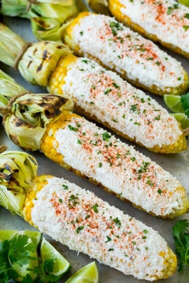 Mexican street corn with mayonnaise, crema, cotija cheese and chili powder.
