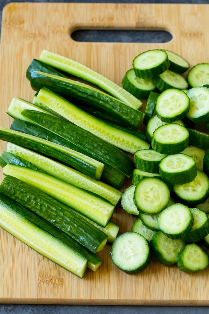 Cucumbers cut into slices and spears.