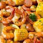 Shrimp boil with tender shrimp, corn on the cob, potatoes and sausage.