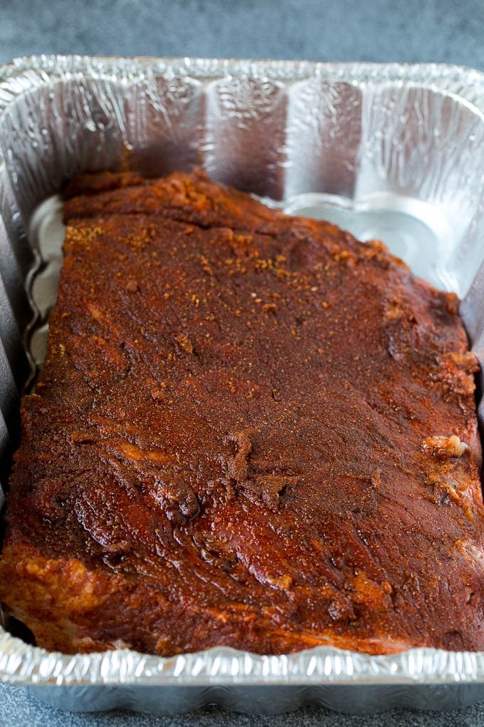 Beef brisket coated in homemade spice rub.