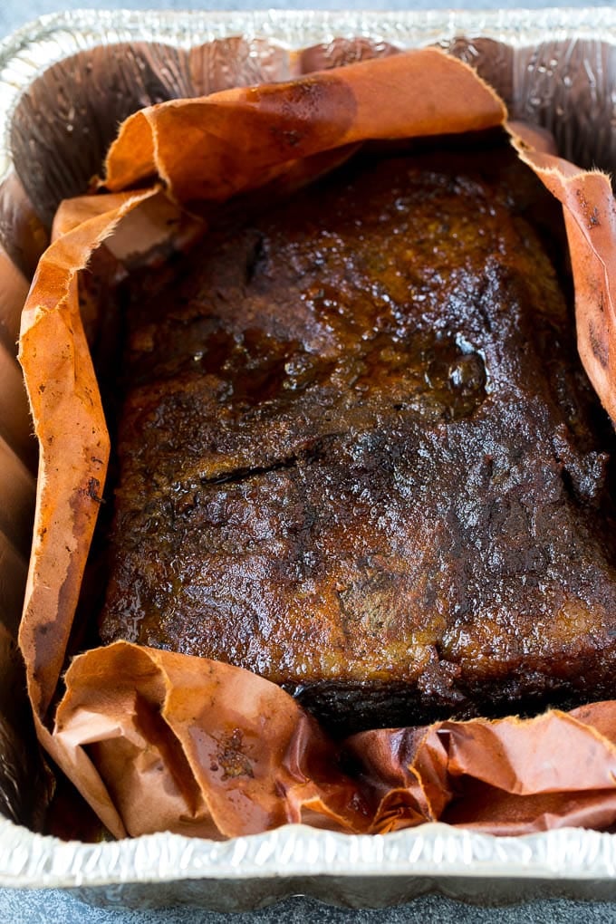 Beef brisket inside butcher paper.