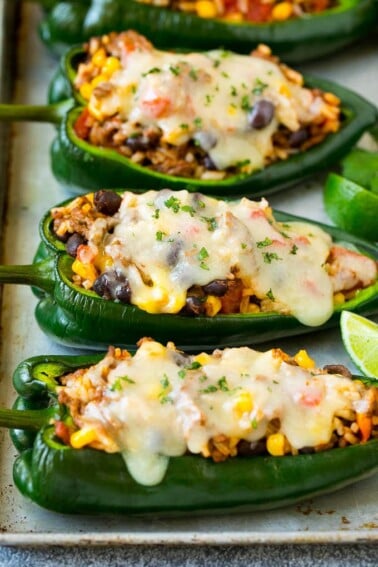 Stuffed poblano peppers filled with rice, corn, beans and meat.