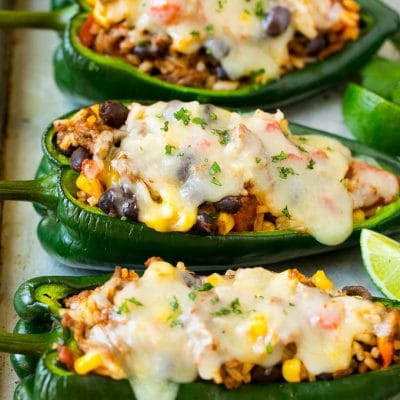 Stuffed poblano peppers filled with rice, corn, beans and meat.