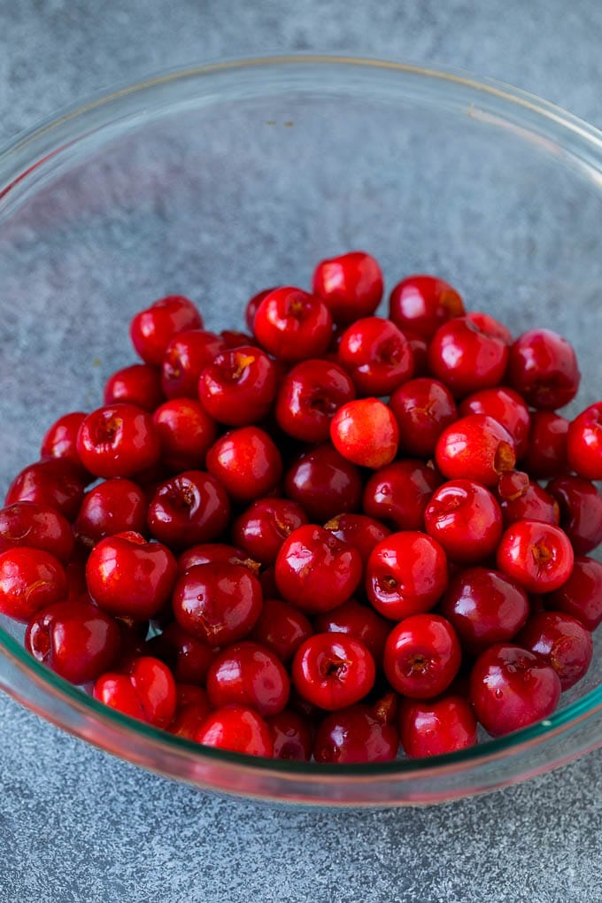 A bowl of pitted cherries.