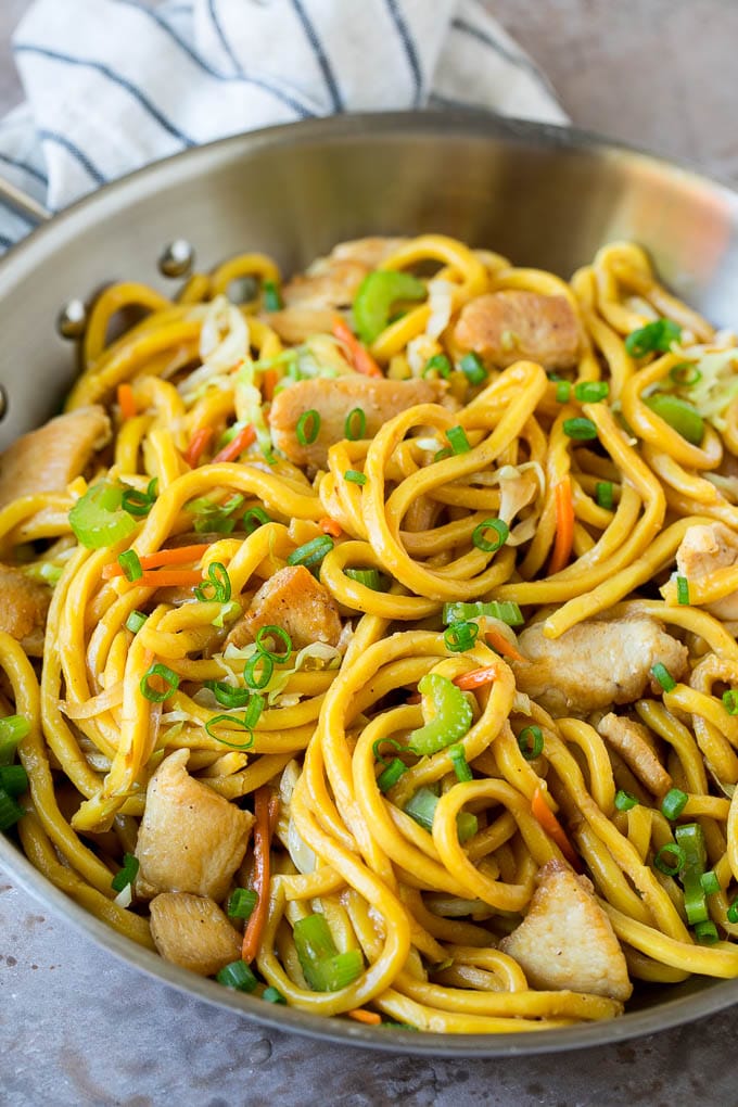 A pan of chicken and vegetable lo mein.