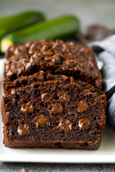 Sliced chocolate zucchini bread filled with melted chocolate.