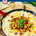 This hot corn dip is made with two types of cheese, bacon, bell peppers and corn, all baked to golden and bubbly perfection.