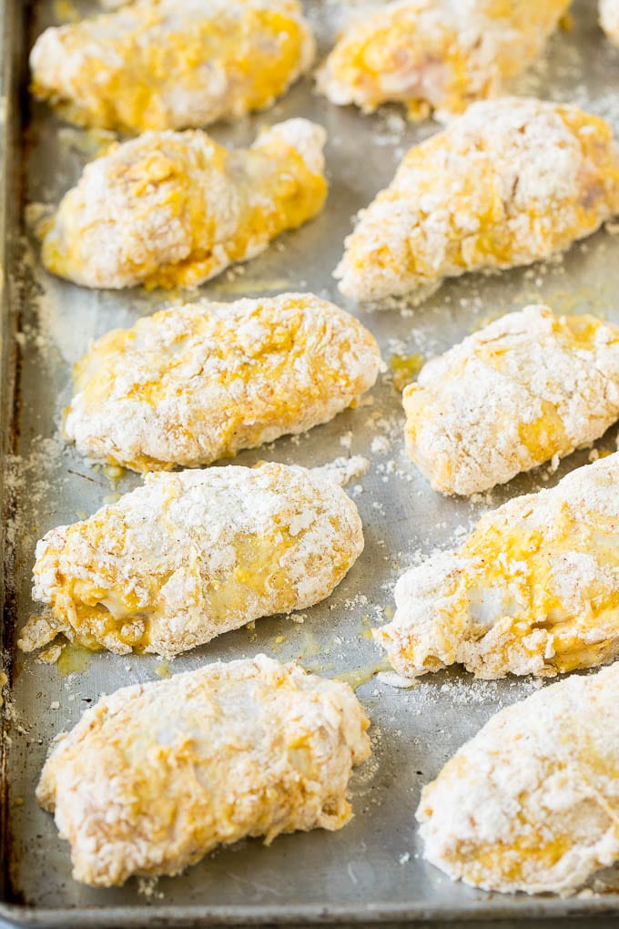 Chicken wings coated in eggs and flour.