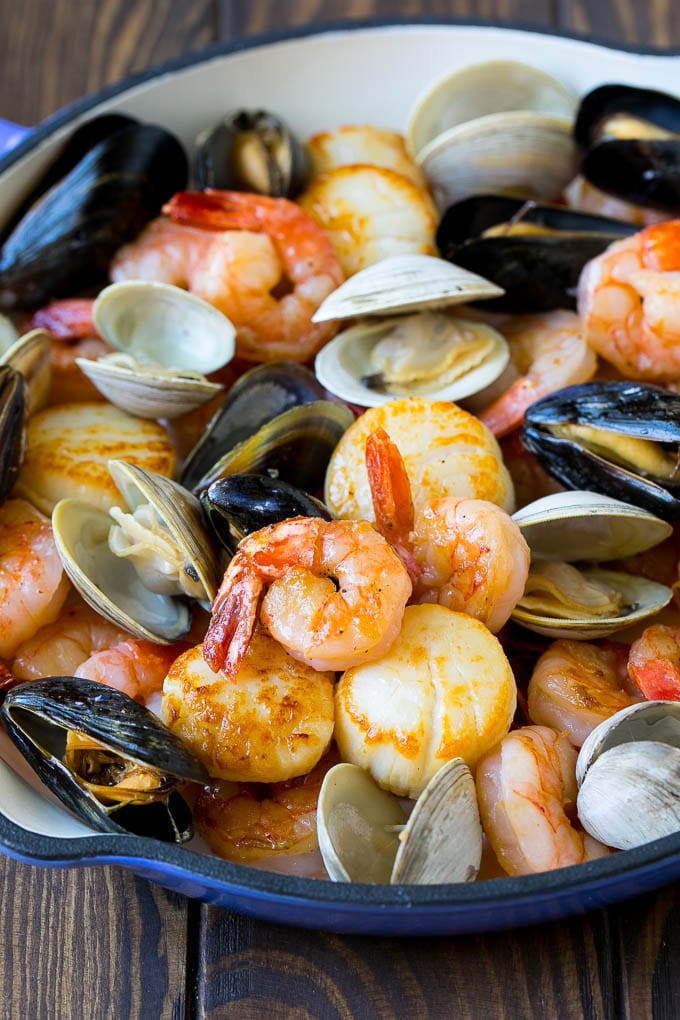 Cooked shrimp, scallops, mussels and clams.