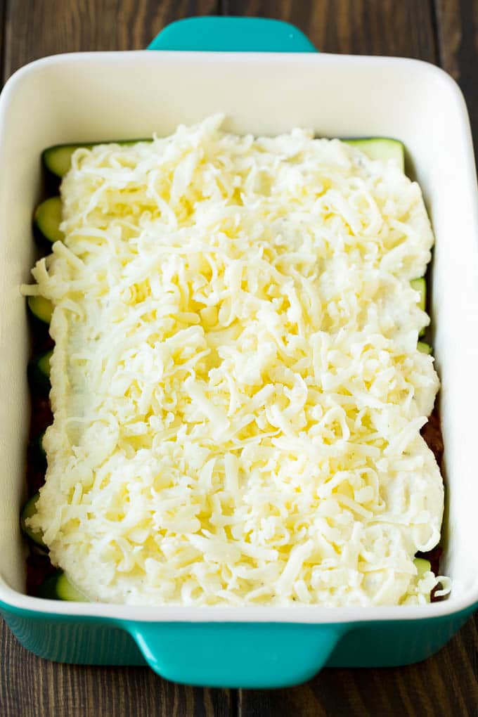 Layers of ricotta and mozzarella cheese in a baking dish.