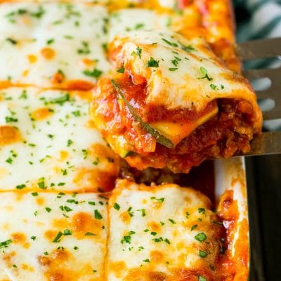 A spatula serving up a portion of zucchini lasagna.