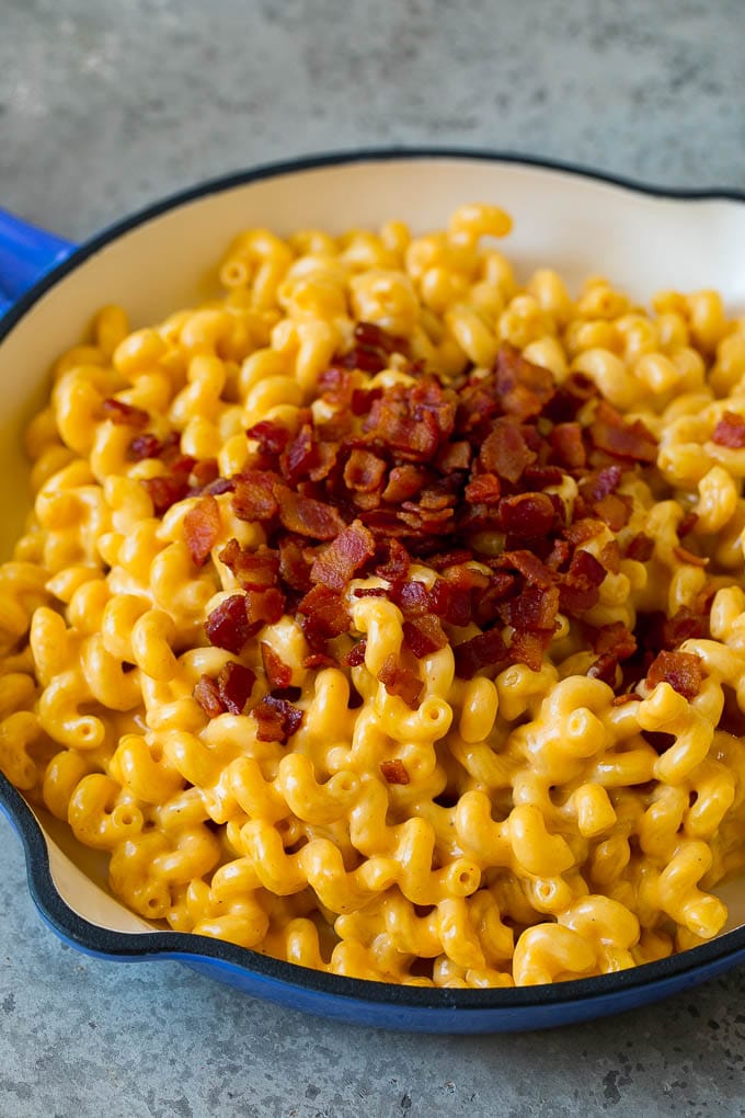 Macaroni and cheese with bacon sprinkled on top.