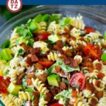 This BLT pasta salad recipe is full of veggies, avocado, pasta and crispy bacon, all tossed in a cool and creamy dressing.