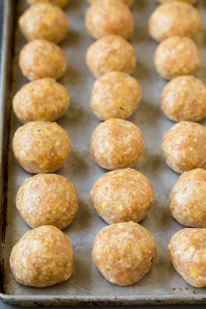 Ground chicken with herbs and spices, rolled into balls.