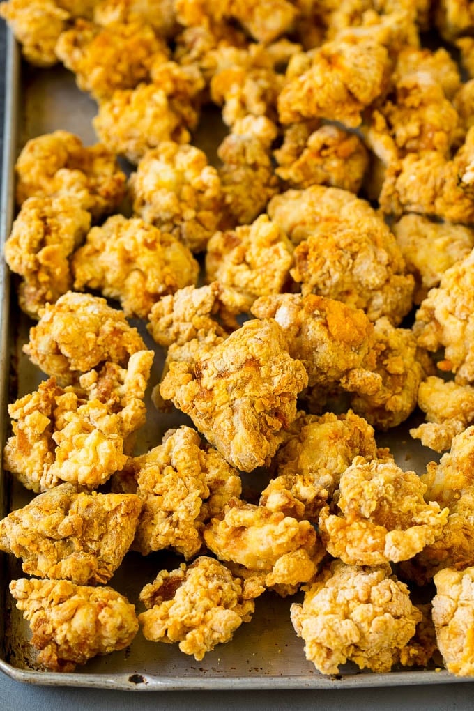 Breaded and fried chicken thigh pieces.