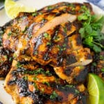 Sliced grilled chicken thighs with cilantro and lime flavoring.