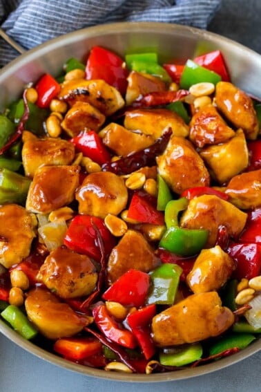 Kung pao chicken with seared chicken breast, bell peppers and peanuts in a savory sauce.