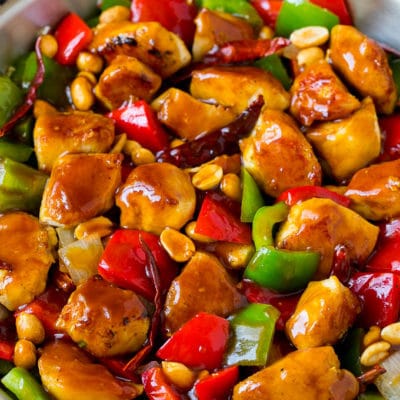 Kung pao chicken with seared chicken breast, bell peppers and peanuts in a savory sauce.