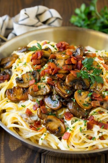 Mushroom pasta with bacon served over creamy linguine.