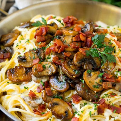 Mushroom pasta with bacon served over creamy linguine.