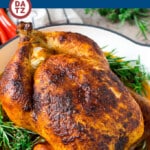 This homemade rotisserie chicken is brined, coated in seasoned butter, then roasted to golden brown perfection.