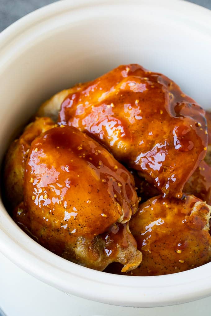 Chicken thighs coated in honey garlic sauce.