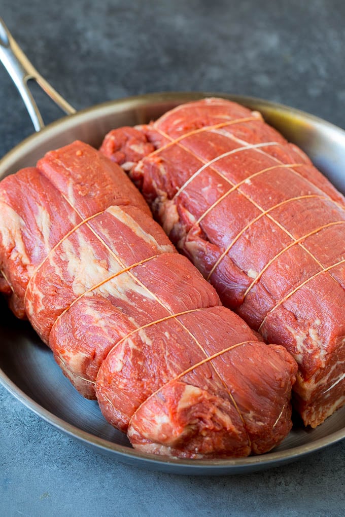 Beef tenderloin roasts tied with twine.